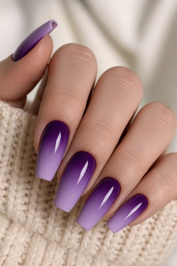 Medium coffin nails. The gradient is very smooth, with no dots. Dark purple fades into a medium lavender and then to a light grape at the tips.