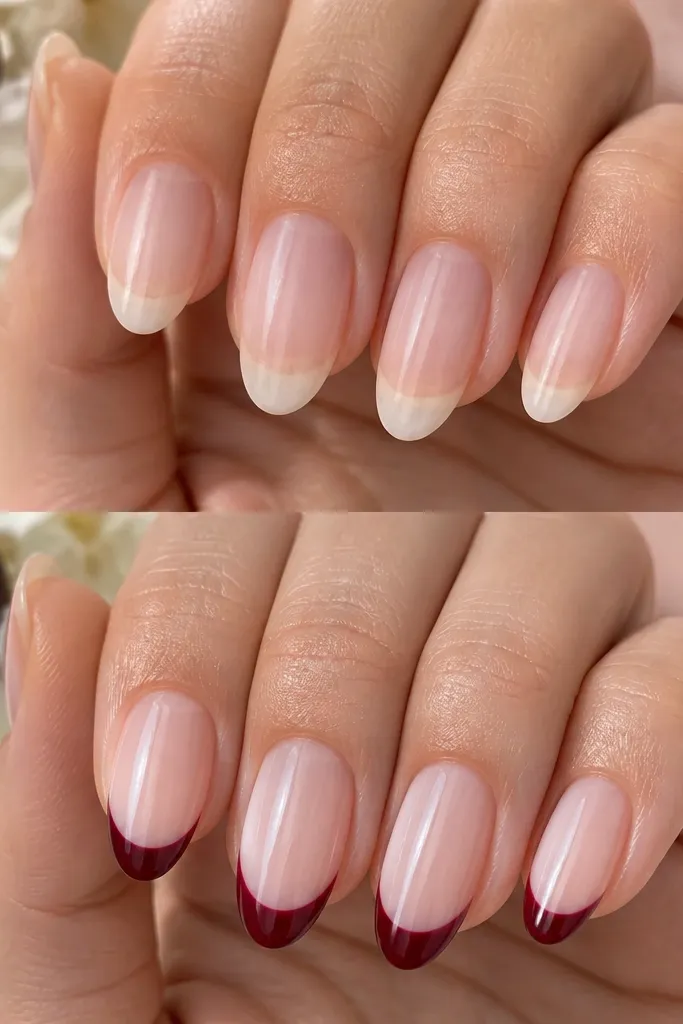 Nails with a sheer nude base and sharp cherry-red French tips. The tips are clean and slightly rounded at the edges, with a glossy finish. There's no other decoration; the French line is the focus.